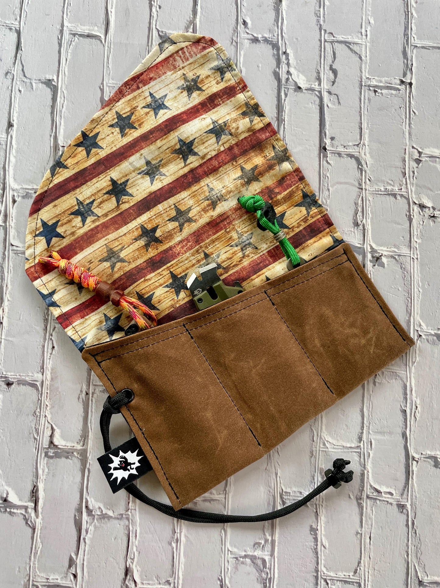 Rugged EDC Tool Roll – Nutmeg Waxed Canvas with Stars and Stripes Liner, Paracord Wrap and Metal Nut Closure, Patriotic Gift for Him